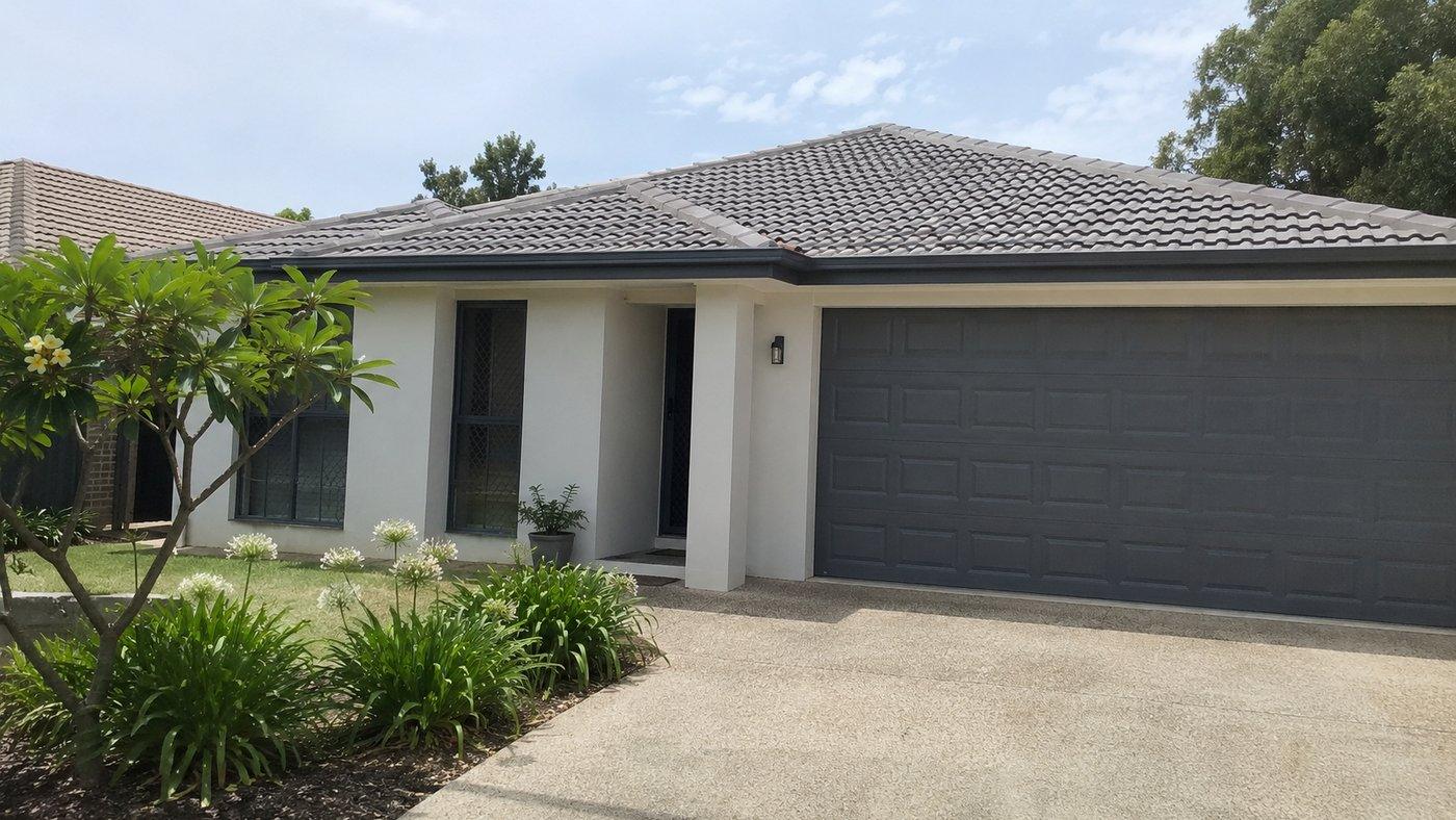 A rendered house exterior painted out, walls, garage door and trim