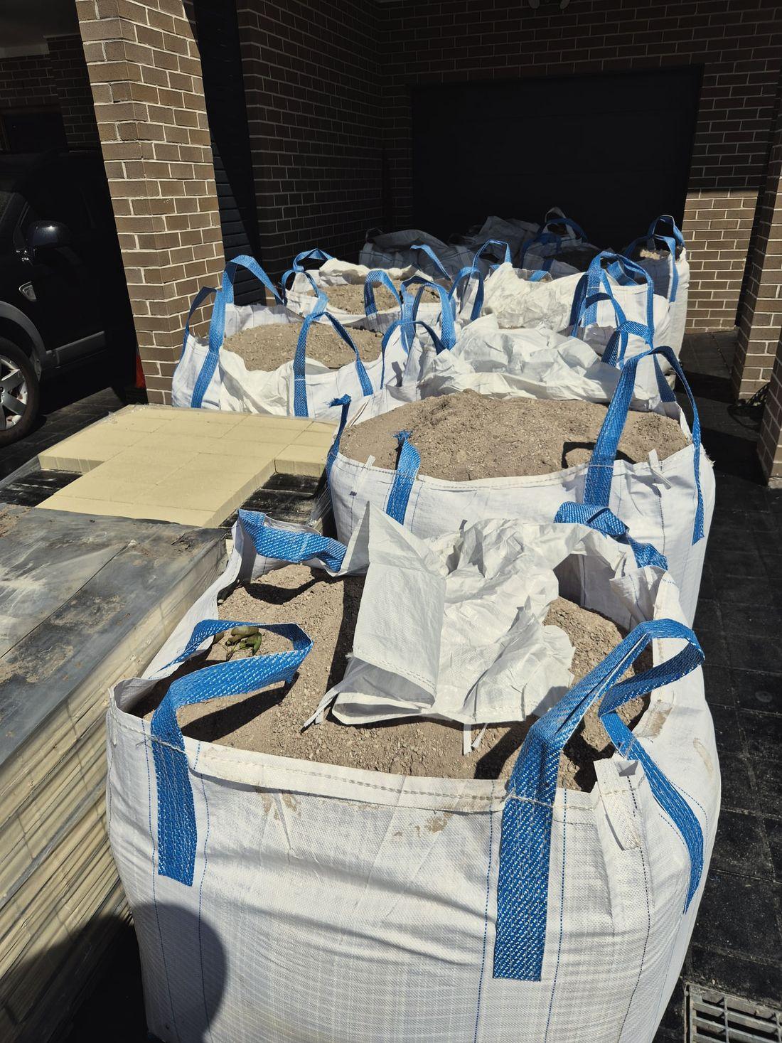 Paving materials delivered on a driveway ready for a job
