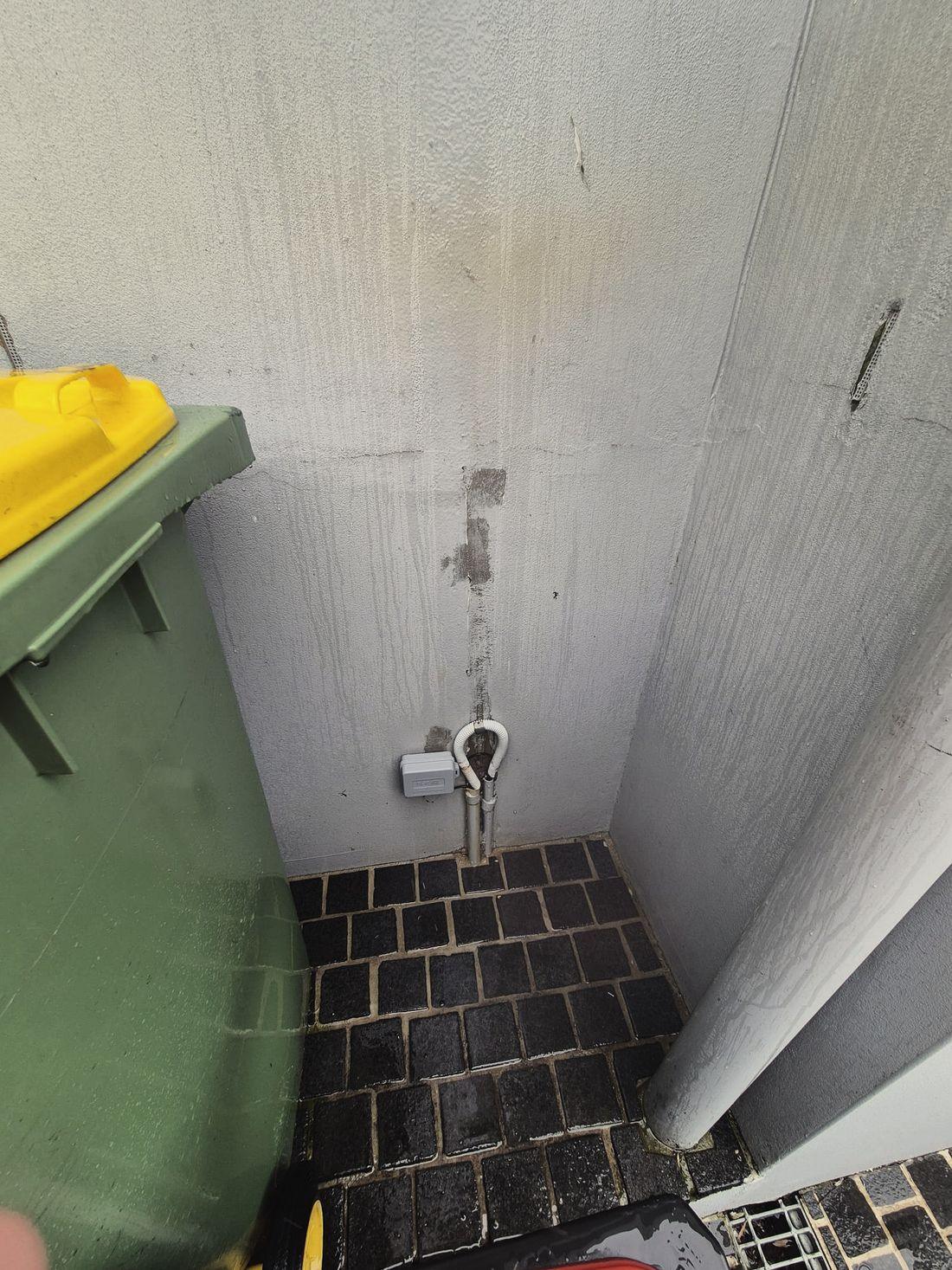 A concrete side passage part way through a pressure clean
