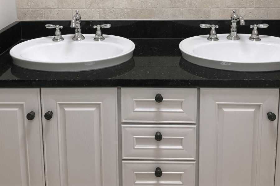 The same vanity refinished in white with new hardware